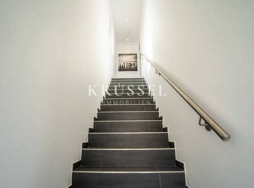 Das Treppenhaus und der Zugang zur oberen Wohnung - 