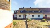 Bild 1 - Vielseitige Doppelhaushälfte mit zwei Wohneinheiten, großem Grundstück in Petersberg OT Steinau