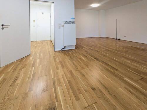 Wohnzimmer mit Blick zum Flur - 