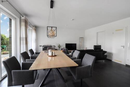 Blick ins Wohn-/ Esszimmer - Doppelhaushälfte mit 148,40 m&sup2; in Gütersloh zum Kaufen