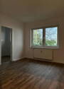 Wohnzimmer_Blick auf den Hof - 