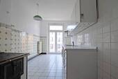 Die Wohnküche mit Balkon-Zutritt - 