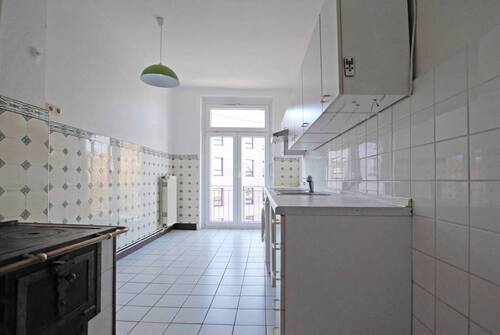 Die Wohnküche mit Balkon-Zutritt - 