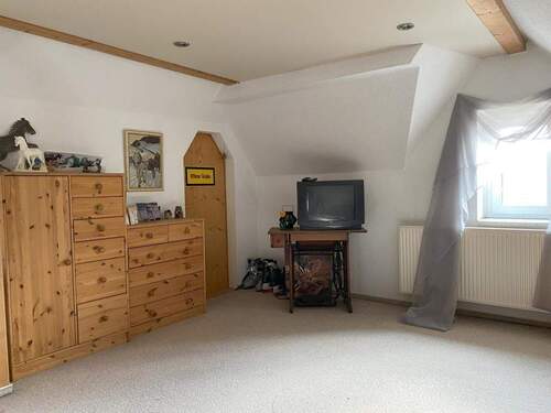 Zimmer im Dachgeschoß - 