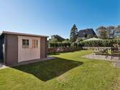 Schöner Gartenbereich mit Holzhütte - 