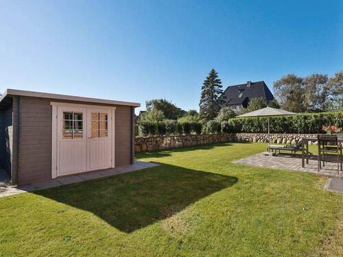 Schöner Gartenbereich mit Holzhütte - 