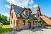 Bild 1 - Neubau-Doppelhaushälfte in ruhiger strandnaher Lage (FW)