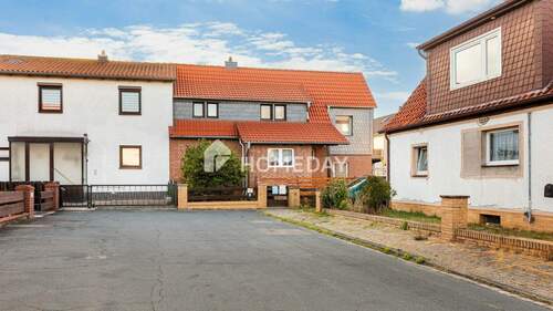 Außenansicht 3 - Charmante Doppelhaushälfte mit 110 m² Wohnfläche und schönem Grundstück in familienfreundlicher Lage