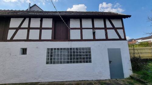 Außenansicht / Garage mit kl. Werkstadt und zusätzliche Abstellflächen - Doppelhaushälfte mit 137,00 m&sup2; in Friedberg zum Kaufen