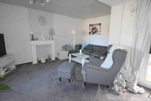 Wohnzimmer - Mehrfamilienhaus, Wohnhaus mit 218,10 m&sup2; in Lägerdorf zum Kaufen