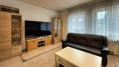 Wohnzimmer EG - Mehrfamilienhaus, Wohnhaus mit 188,90 m&sup2; in Mönchengladbach zum Kaufen