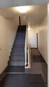 Treppe zum 1. OG. - 