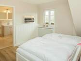 Schlafraum mit Bad en Suite im Obergeschoss - 