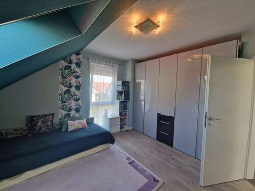 Zimmer im Dachgeschoss - 
