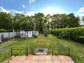 Blick von Terrasse in Garten - Realisieren Sie Ihren Traum mit einem Neubauprojekt oder einer hochwertigen Modernisierung des EFH-Gebäudebestandes in bevorzugter Wohnlage südlich de