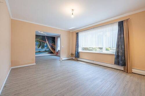 Wohnzimmer - Einfamilienhaus mit 100,00 m² in Schenefeld zum Kaufen