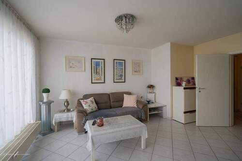 Wohnzimmer - Etagenwohnung mit 78,40 m&sup2; in Unterhaching zum Kaufen