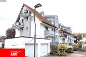 Außenansicht - Attraktive 1-Zimmer-Eigentumswohnung mit Terrasse, Gartenanteil und Tiefgaragenstellplatz in begehrt