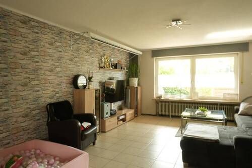Wohnzimmer Erdgeschoss - 1 Zimmer Mehrfamilienhaus, Wohnhaus zum Kaufen in Breddenberg