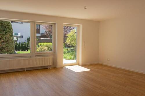 Wohnzimmer - Reihenmittelhaus mit 125,60 m&sup2; in Taufkirchen zum Kaufen
