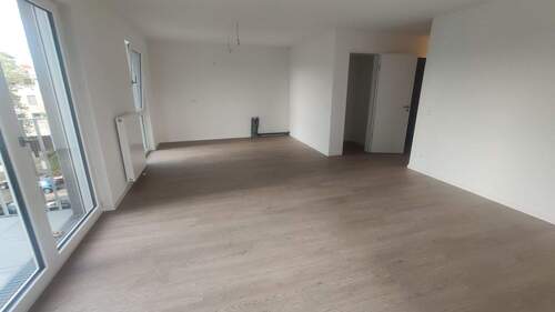 Wohnzimmer mit offener Küche.jpg - 