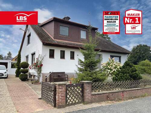 Straßenansicht - Gepflegt und großzügig - Zweifamilienhaus mit Gartenidylle, das Ihnen ...