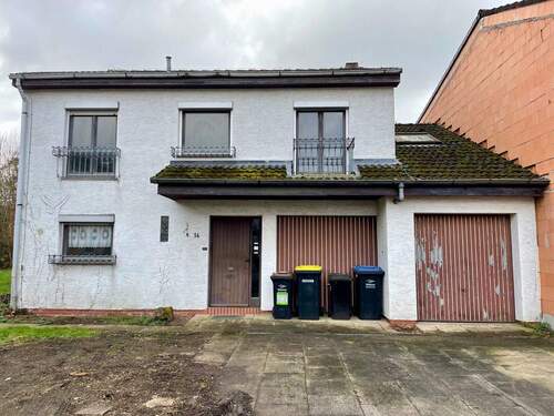 Straßenansicht - Einfamilienhaus mit großem Gartenparadies - Sanierungsprojekt in bester Lage von Niddatal-Assenheim