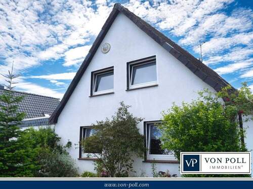 Titelbild - Ebenerdiges Wohnen: Großzügiges Einfamilienhaus mit Carport