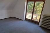 Zimmer im Dachgeschoss - 