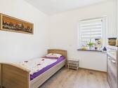 Kinderzimmer im Erdgeschoss - 