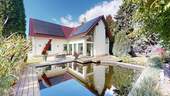 Haus vom Garten aus (Osten) - Bestensee: modernes freistehendes Architektenhaus mit Kamin, Sauna und Photovoltaik