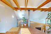 Wohnzimmer oben mit Galerie - 