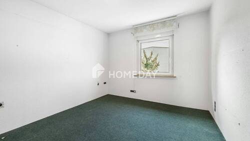 1. OG Schlafzimmer 1 - 