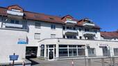 Eingang Apotheke - Etagenwohnung mit 68,00 m² in Freital zum Kaufen