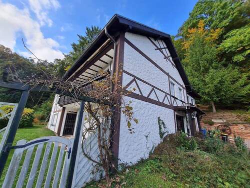 Bild 1 - Großzügiges Einfamilienhaus mit Einliegerwohnung in bester und ruhiger Süd-und Waldrandlage