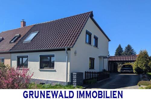 Ansichten - Attraktive Doppelhaushälfte mit großzügigem Grundstück und sonniger Dachterrasse.