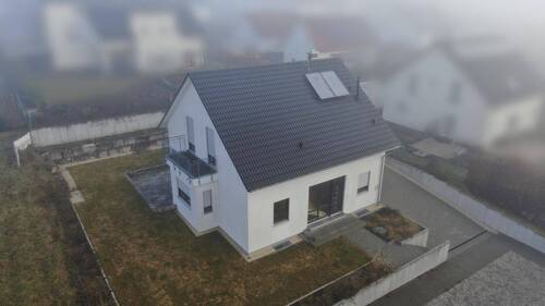 Bild 2 - 8 Zimmer Einfamilienhaus zum Kaufen in Langgöns Oberkleen