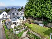 Gartenansicht mit Gebäude - 7 Zimmer Einfamilienhaus zum Kaufen in Wadgassen