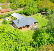 Holzhaus in Bungalowform mit einem ca. 3200 m² großen Grundstück - Sankt Michaelisdonn