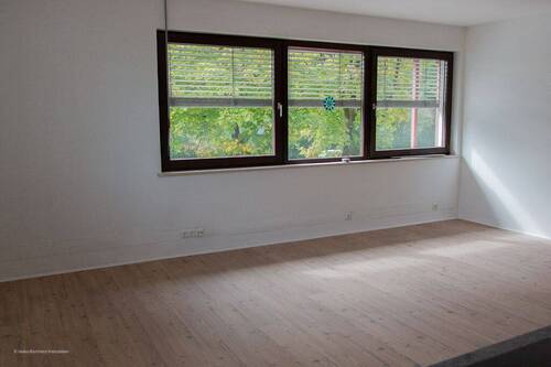 Wohnzimmer - Etagenwohnung mit 84,00 m² in Unterhaching zum Kaufen