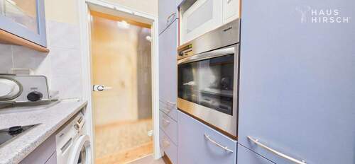 Küche – hochwertige Geräte & viel Stauraum - 