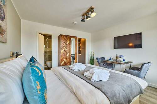 Blick vom Bett - 1 Zimmer Etagenwohnung zum Kaufen in Wenningstedt-Braderup (Sylt)