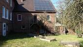 Anbau vom Garten aus - 1 Zimmer Mehrfamilienhaus, Wohnhaus in Dörentrup