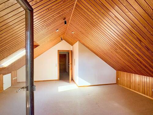 Zimmer im Dachgeschoss - 