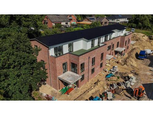 Westansicht - 4 Zimmer Etagenwohnung zum Kaufen in Boostedt