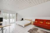Schlafzimmer mit Balkon - 