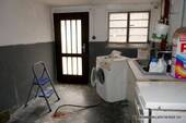 Hauswirtschaftsraum mit Kellerausgang - 