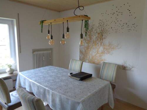 Das Wohnzimmer DG - 7 Zimmer Einfamilienhaus zum Kaufen in Wertheim-Bettingen