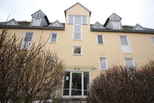 Hausansicht - Vermietete 1,5-Zimmer-Wohnung mit Balkon, Stellplatz und Kellerabteil