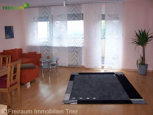 Bild 1 - Hetzerath: Vermietete 3ZKB Eigentumswohnung mit Balkon und Garage.